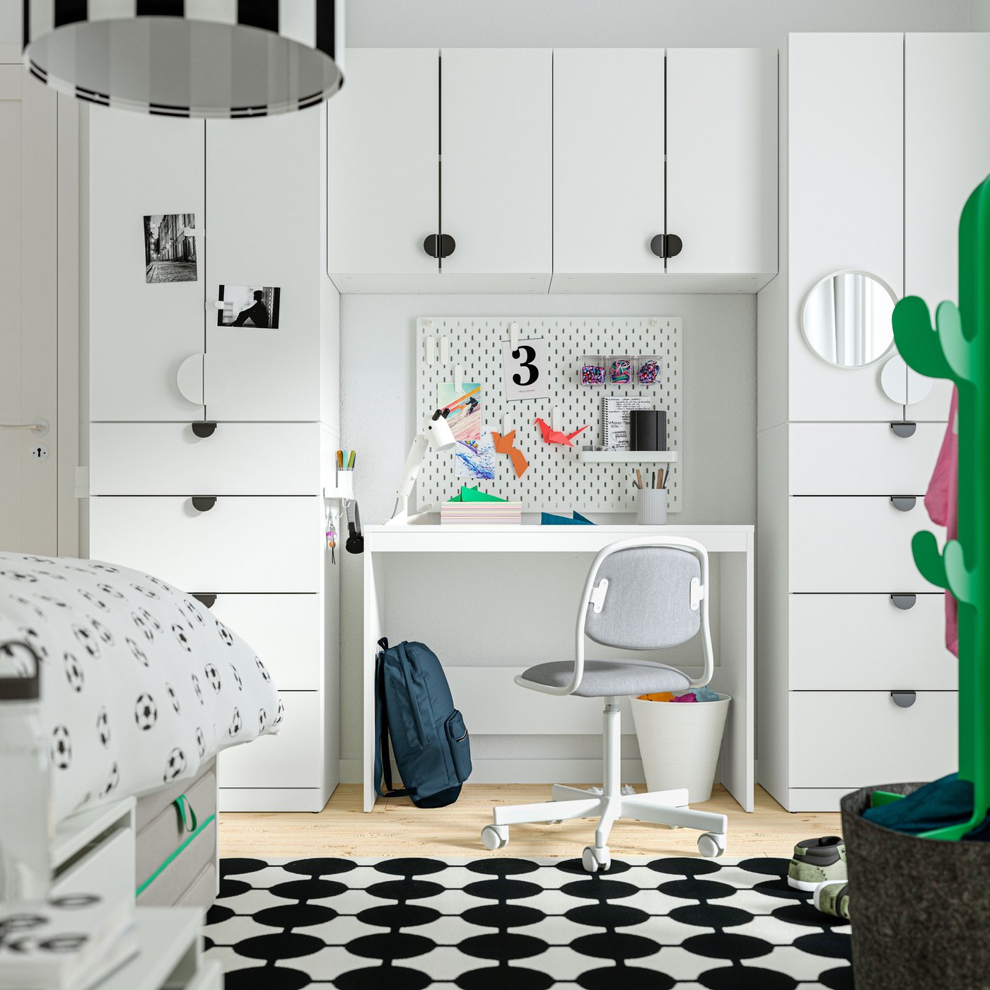 A white LASTARE storage combination in the childrens room