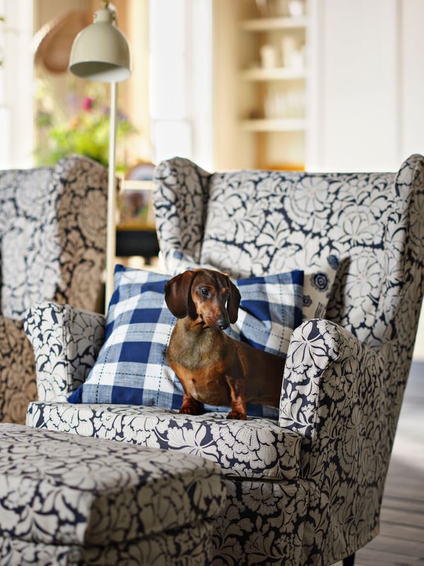 A light beige RÖDFLIK floor/reading lamp