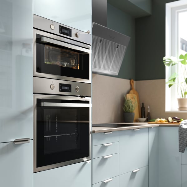 A high-gloss light grey-blue KALLARP door