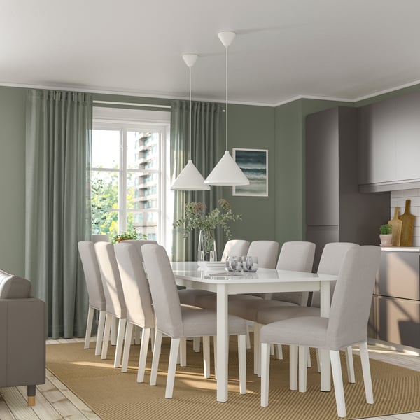 A white/Orrsta light grey BERGMUND table and 8 chairs