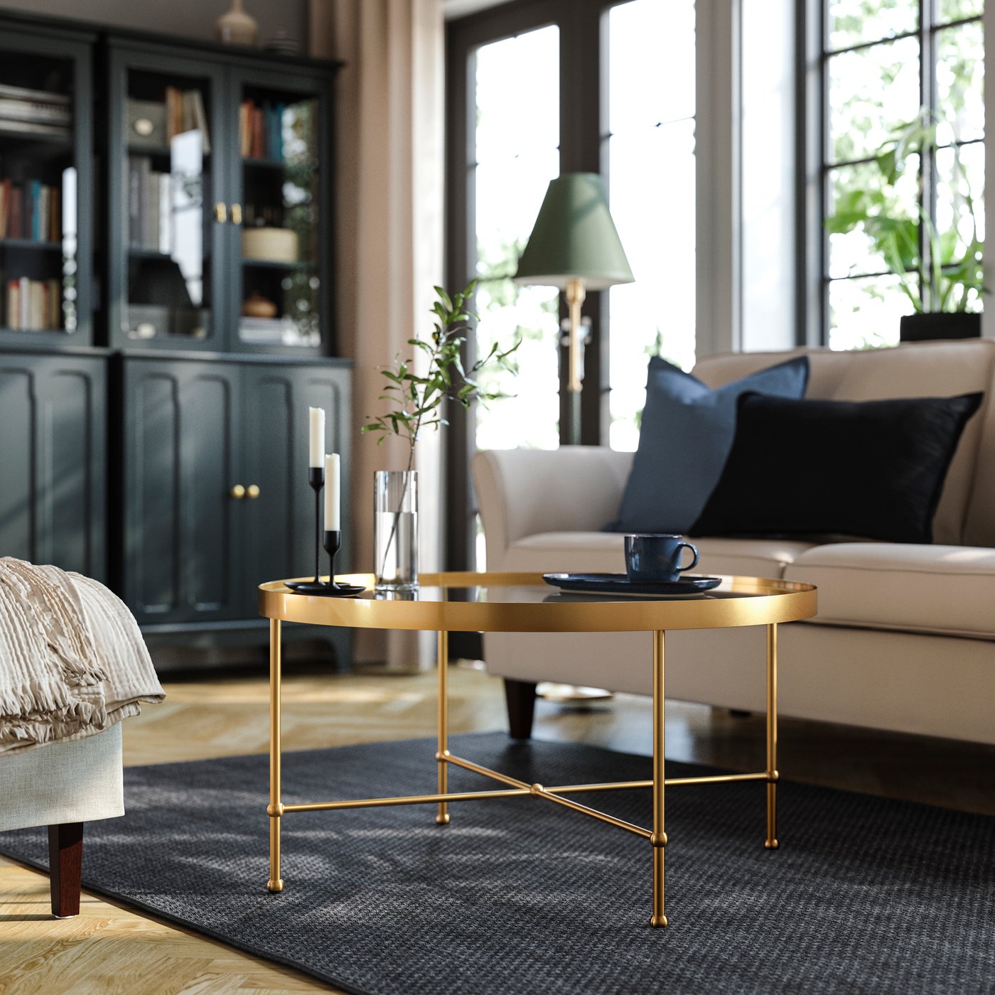 A gold effect/glass TORSJÖ coffee table
