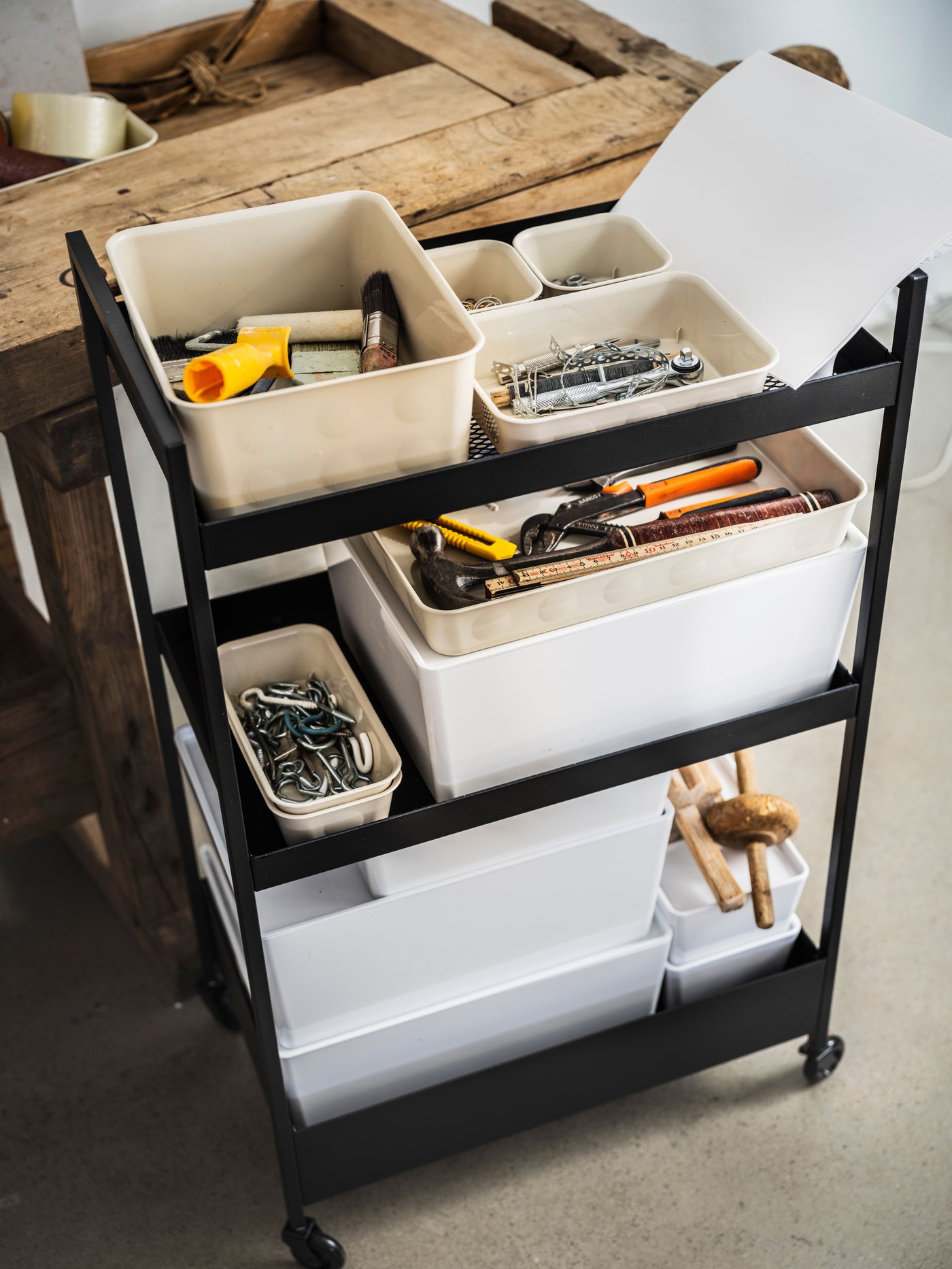 A plastic/beige NOJIG organiser