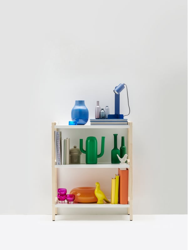 A bright green ÄRTBUSKE vase/watering can
