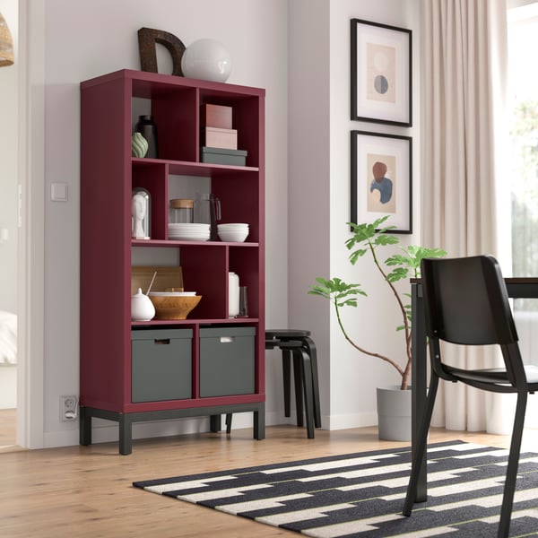 A brown-red/black KALLAX shelving unit with underframe