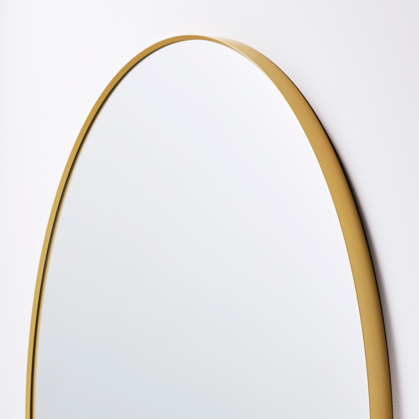A gold-colour LINDBYN mirror