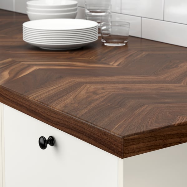 A walnut/veneer BARKABODA worktop in the kitchen
