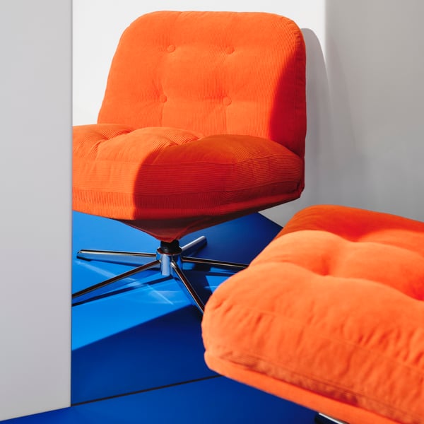 A Kelinge orange DYVLINGE swivel easy chair