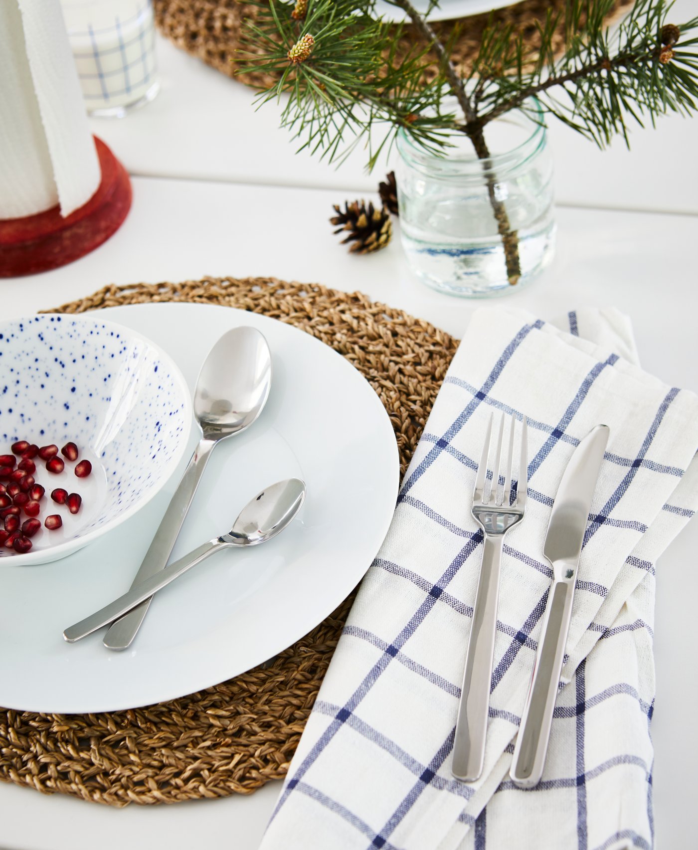 An angled sides white/blue SPORADISK bowl in the dining room