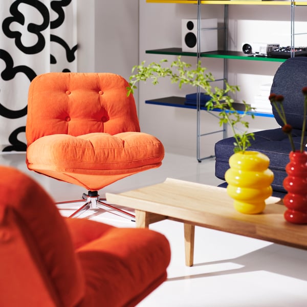 A Kelinge orange DYVLINGE swivel armchair