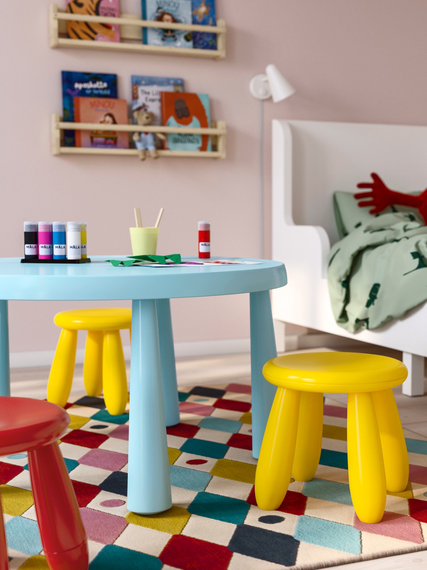 In/outdoor yellow and red MAMMUT children's stools at a blue MAMMUT table in a colourful children's room