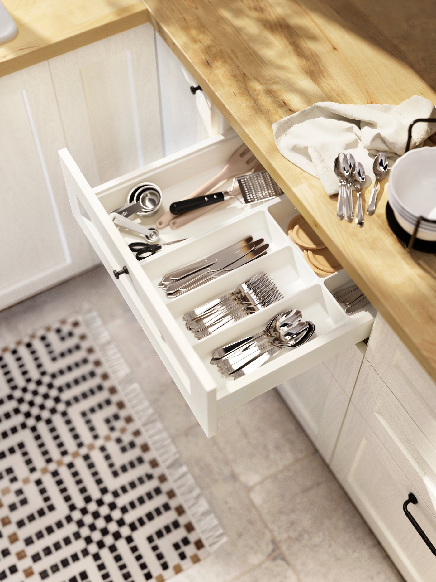 A stainless steel IDENTITET 16-piece cutlery set