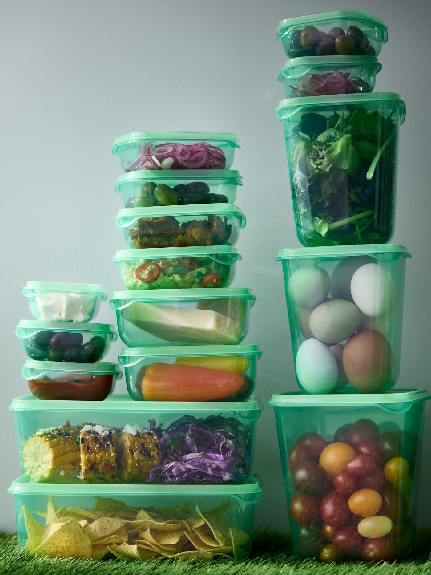 A green PRUTA food container with lid