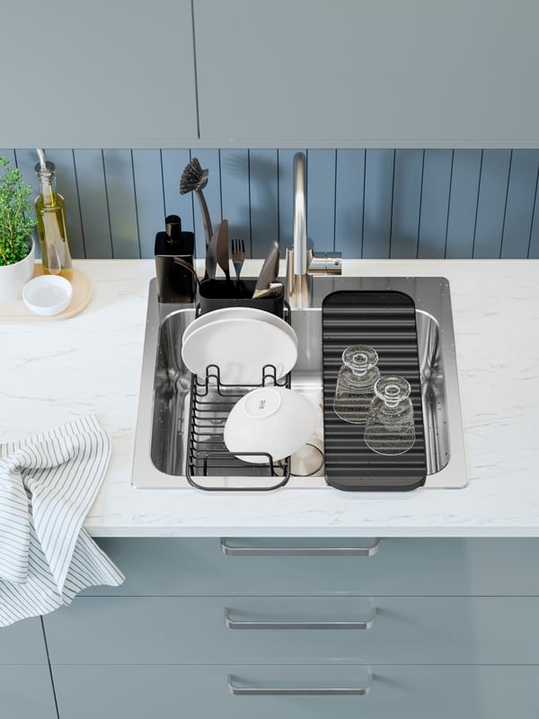 An anthracite LILLHAVET multifunctional dish rack in the kitchen