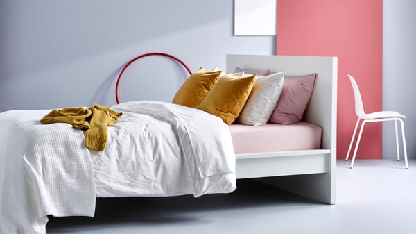 A white DVALA duvet cover and pillowcase