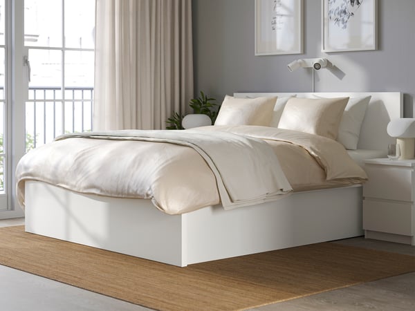 A white MALM ottoman bed.