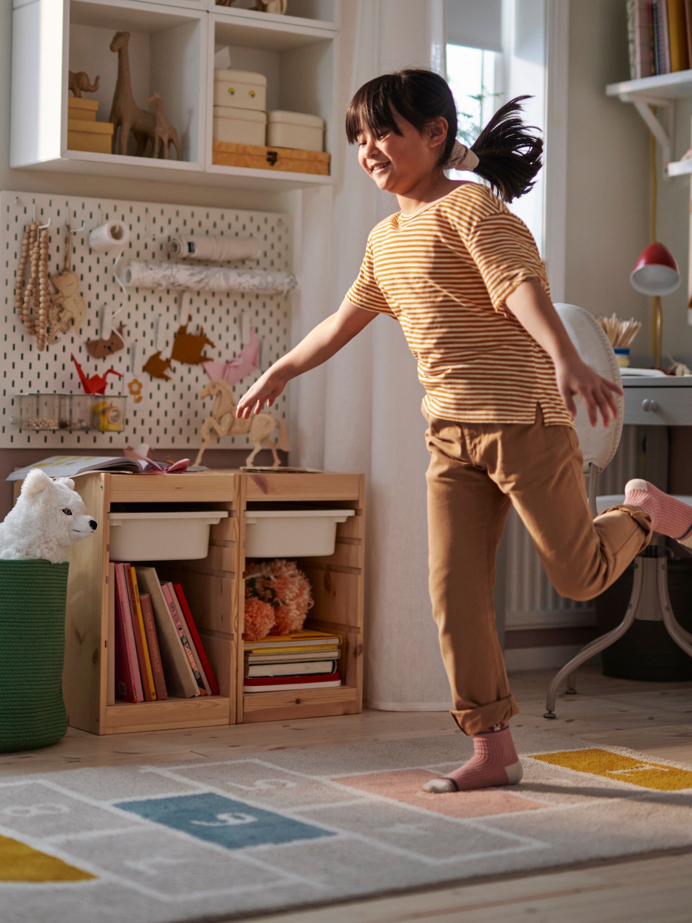 A white TROFAST storage box in the NA 
