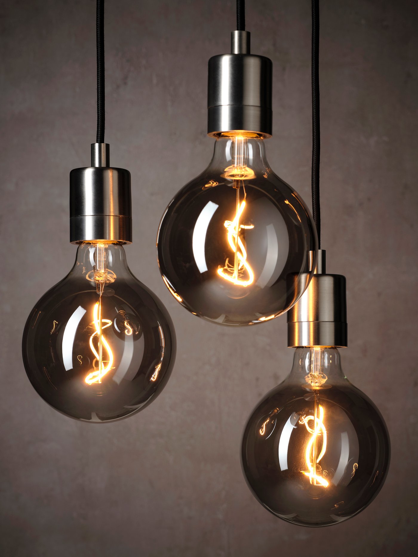 A globe grey clear glass MOLNART LED bulb E27 140 lumen