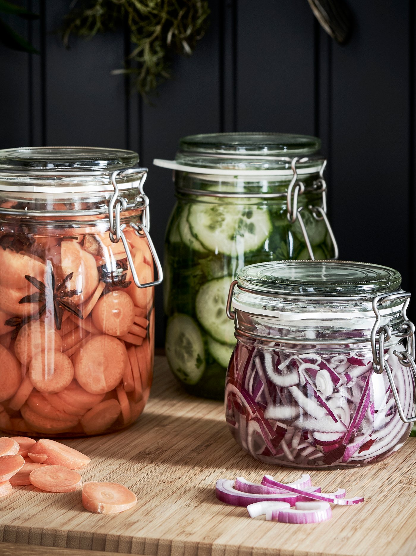 A clear glass KORKEN jar with lid