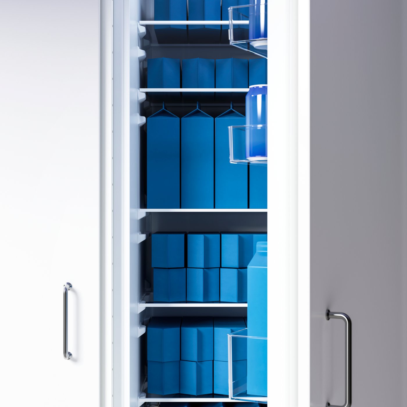 Un frigorífic FORSNÄS integrat darrere de frontals VEDDINGE blancs amb una porta oberta; a dins, s'hi desen envasos de color blau intens.