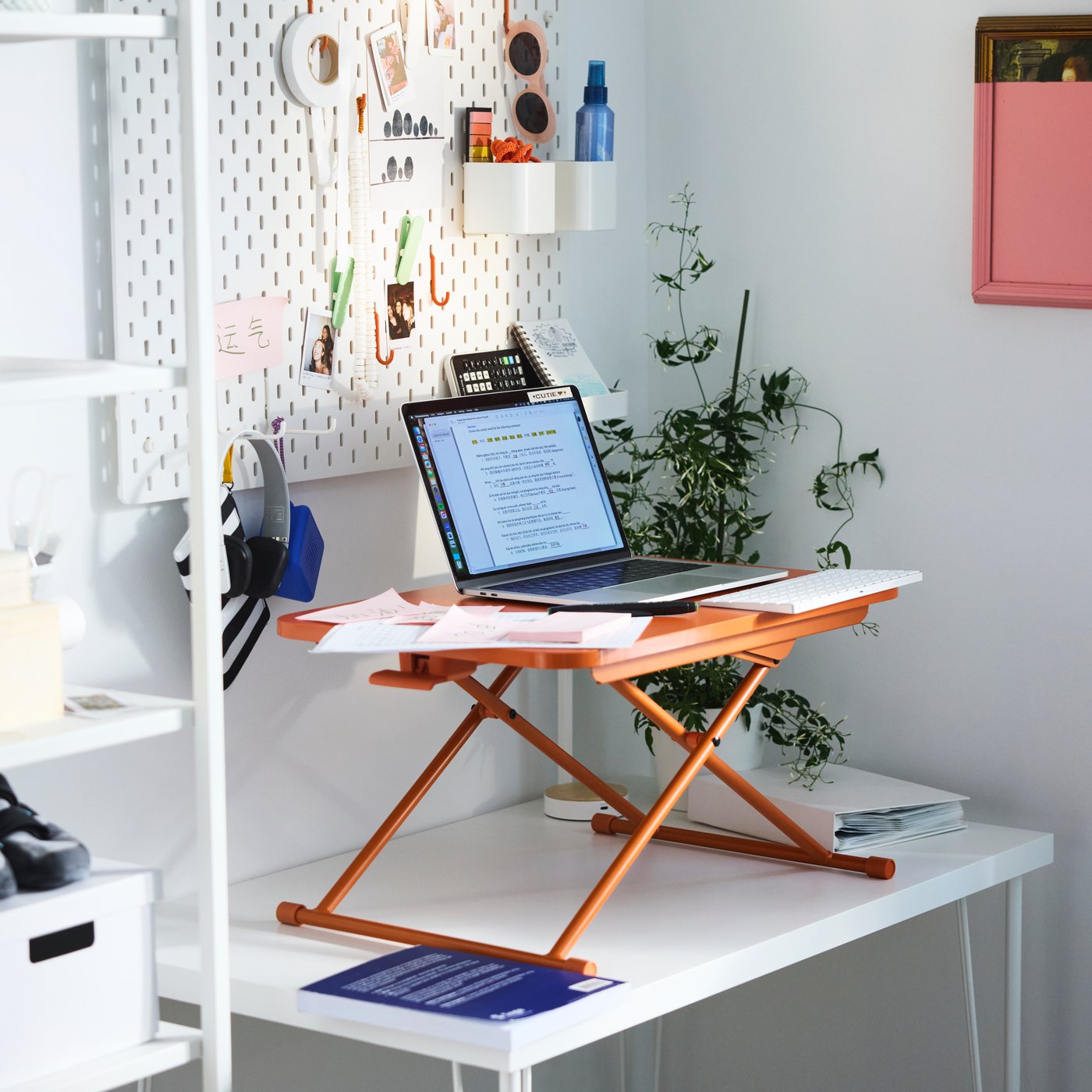 A white PLATSA open shelving unit in the home office