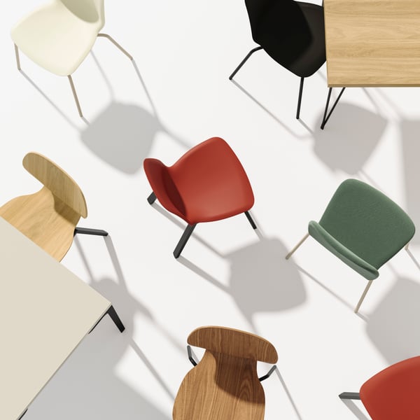 An eagle-eye’s view of different combinations of SKÅLSTA chairs and SKÅLSTA tables placed randomly on a surface.