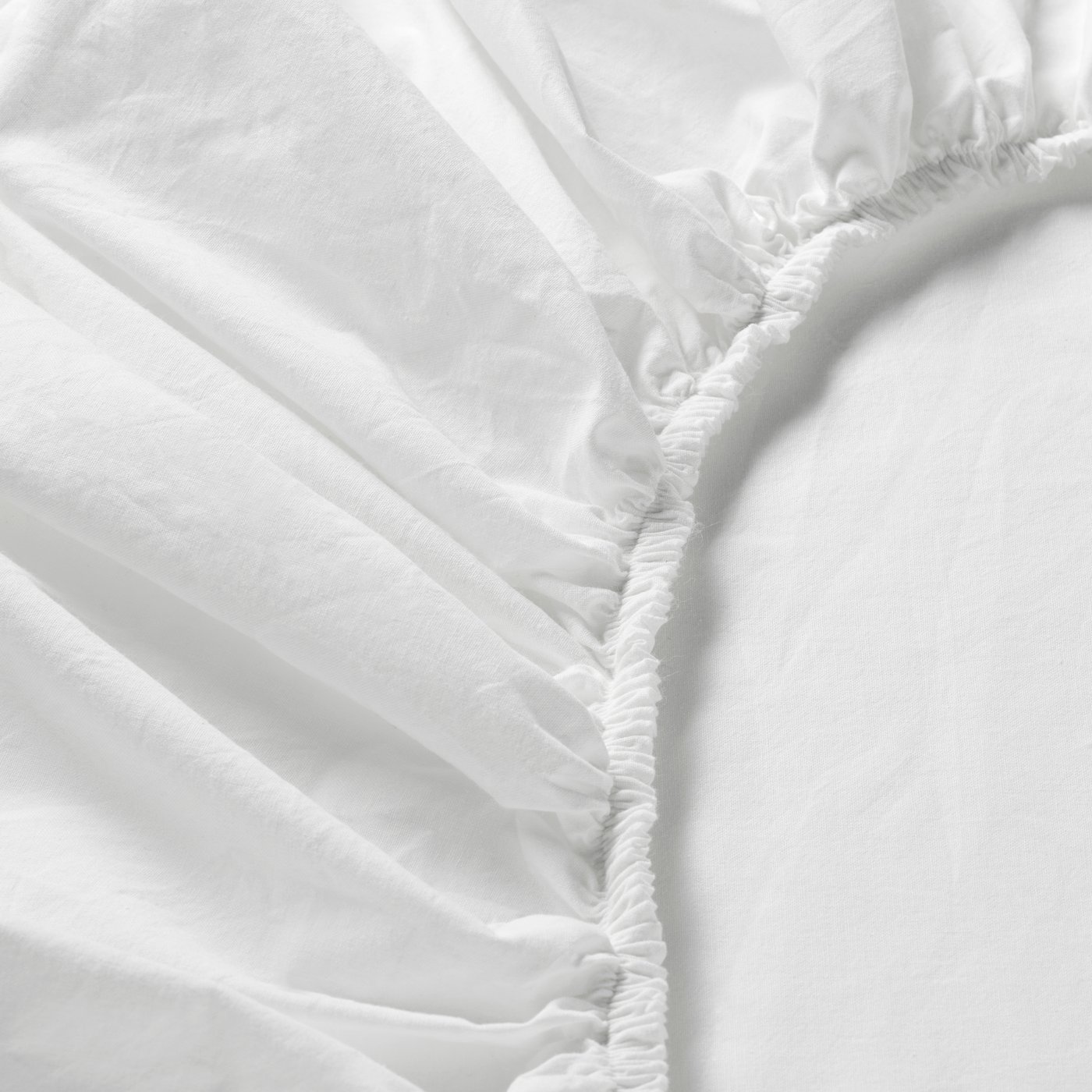 A white DVALA fitted sheet in the NA