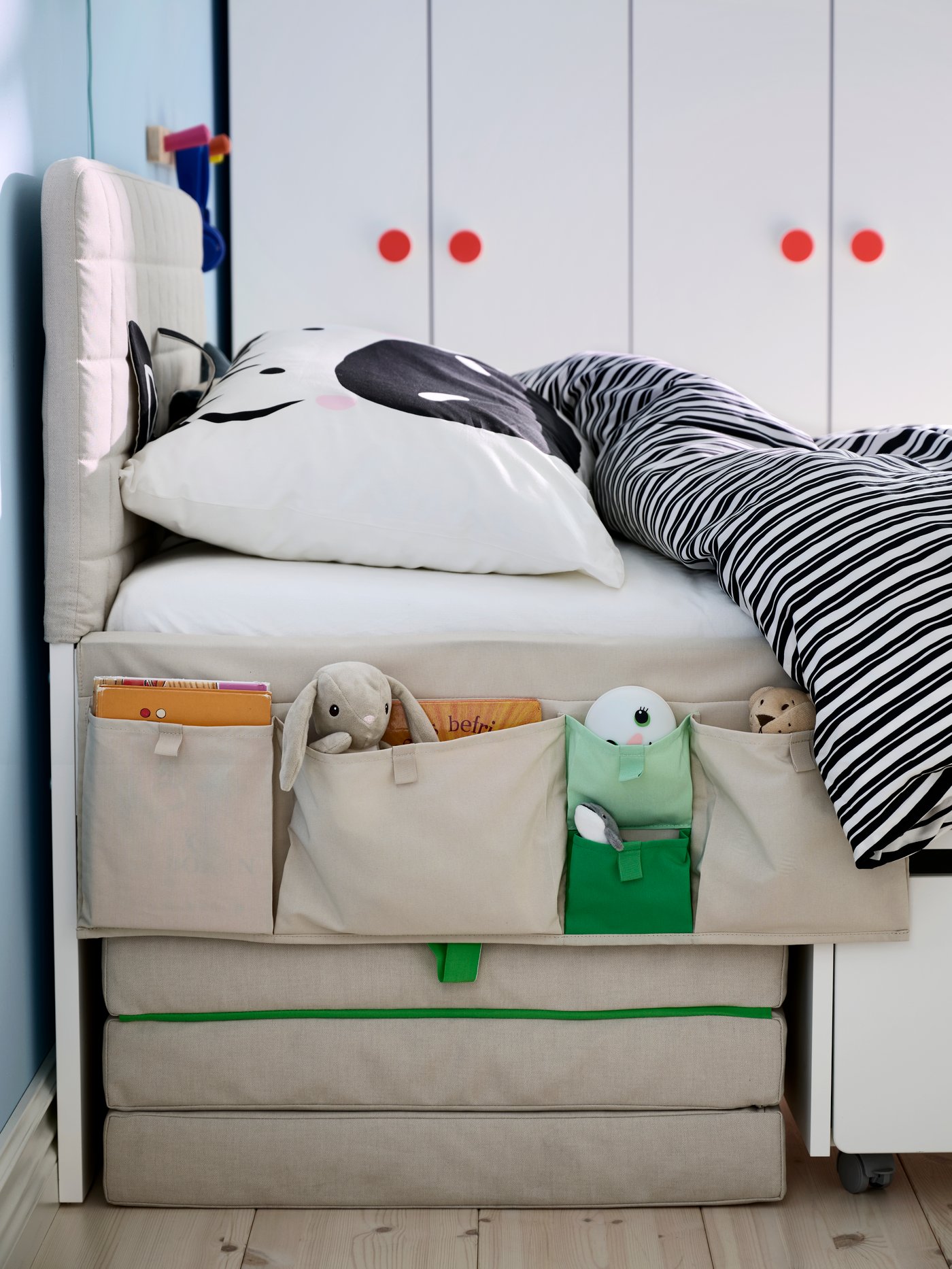 A black white/zebra NATTHÄGER duvet cover and pillowcase in the childrens room