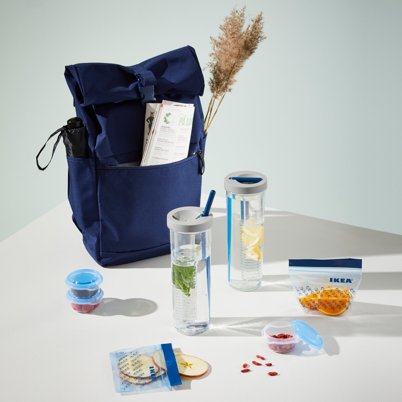 A blue STARTTID backpack in the kitchen