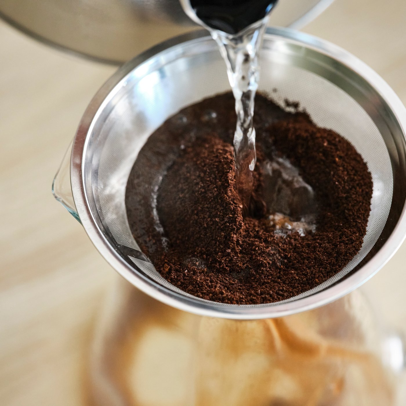 A clear glass/stainless steel HÖGMODIG coffee maker for drip coffee