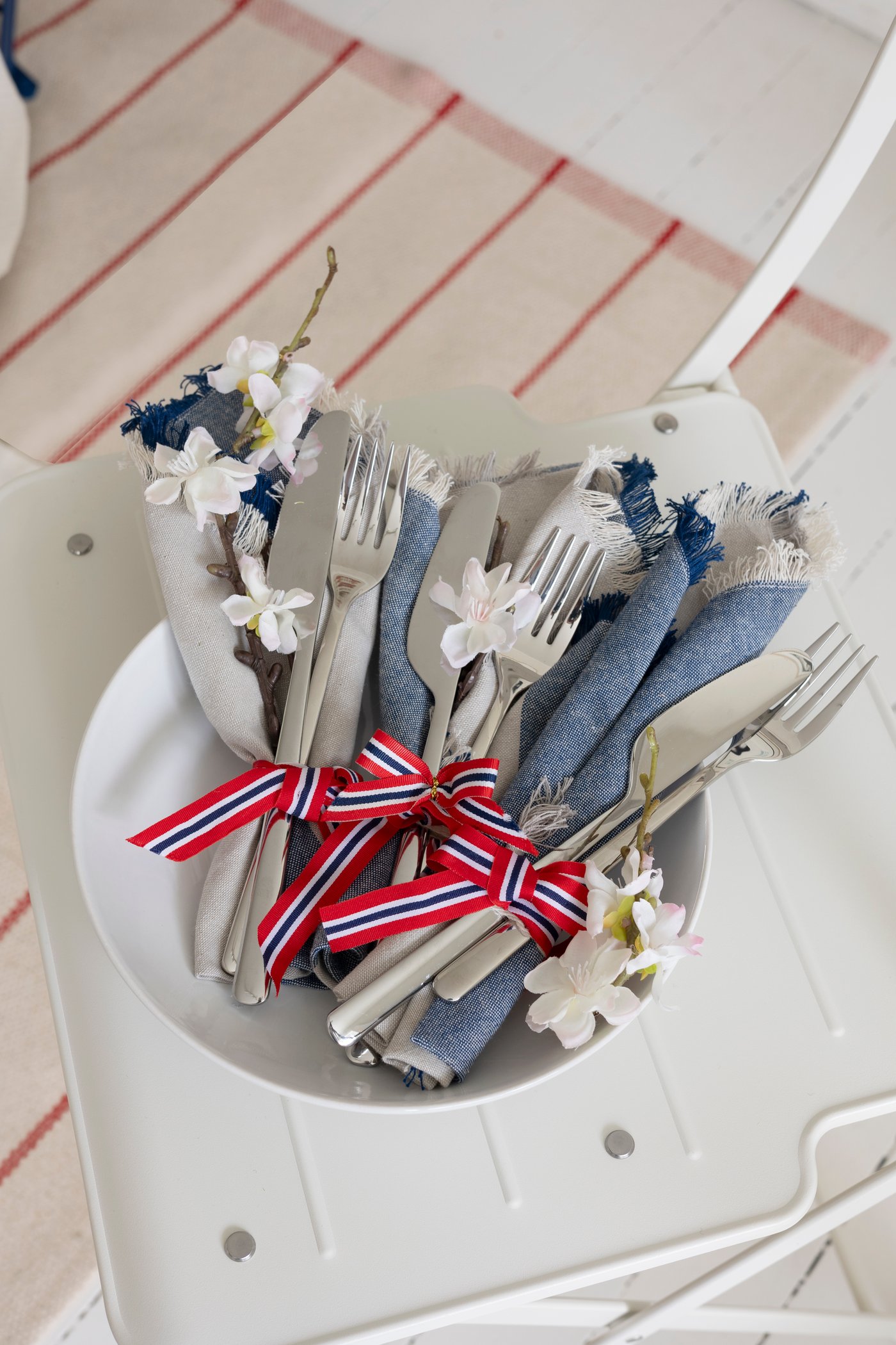 Cutlery with ribbons.