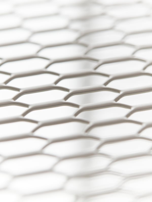 A close-up of the mesh material of a BAGGEBO shelving unit. Part of a collage of images.