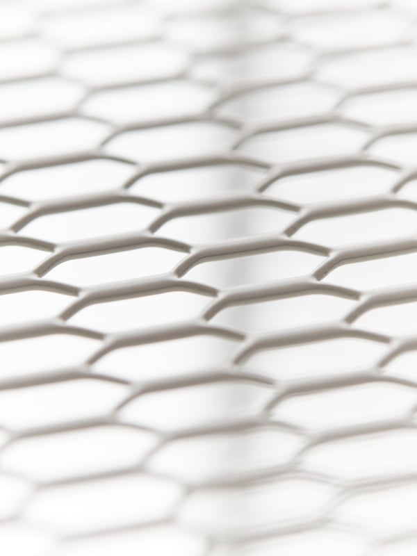 A close-up of the mesh material of a BAGGEBO shelving unit. Part of a collage of images.