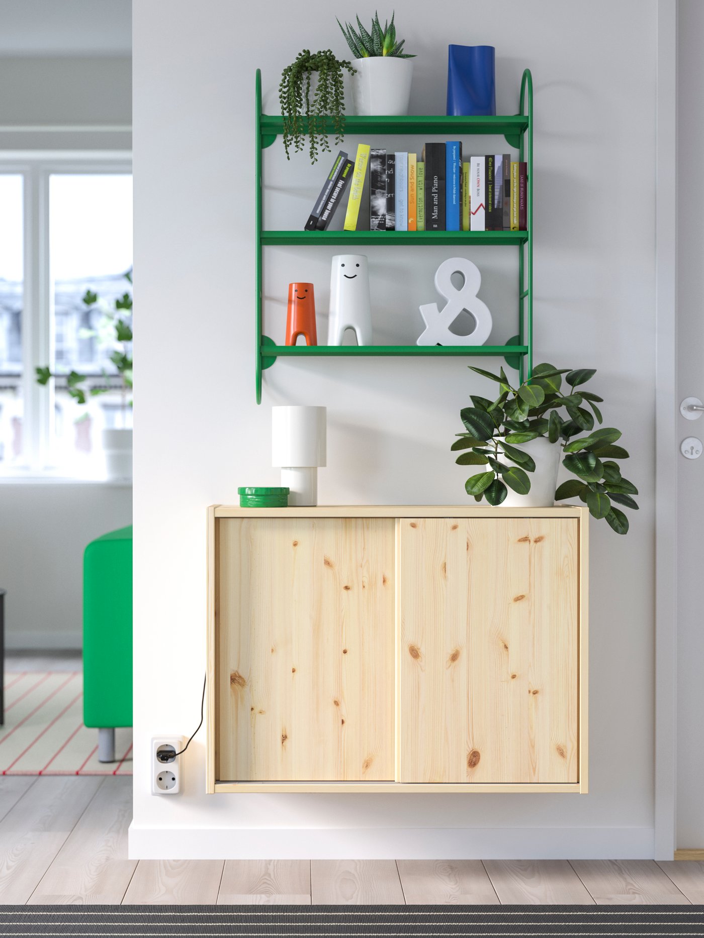 A green FÄRGSÄTTARE wall shelf