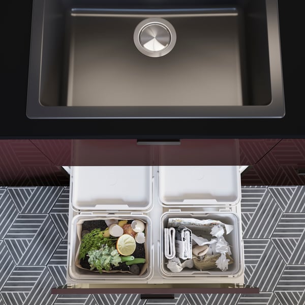 A black quartz composite HÄLLVIKEN single-bowl inset sink in the kitchen