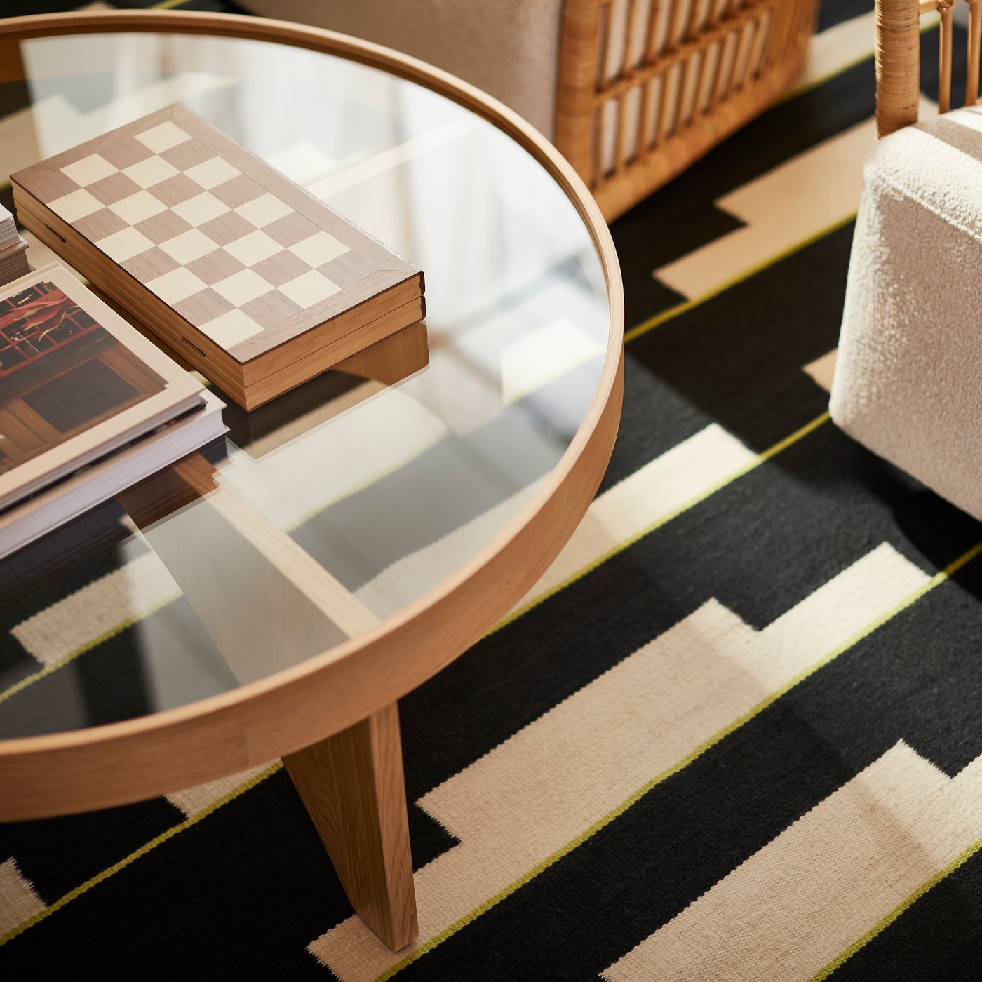 A black/white/light green handwoven STOCKHOLM 2025 rug, flatwoven