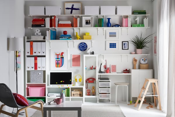 White KVISSLE newspaper rack in a child's bedroom