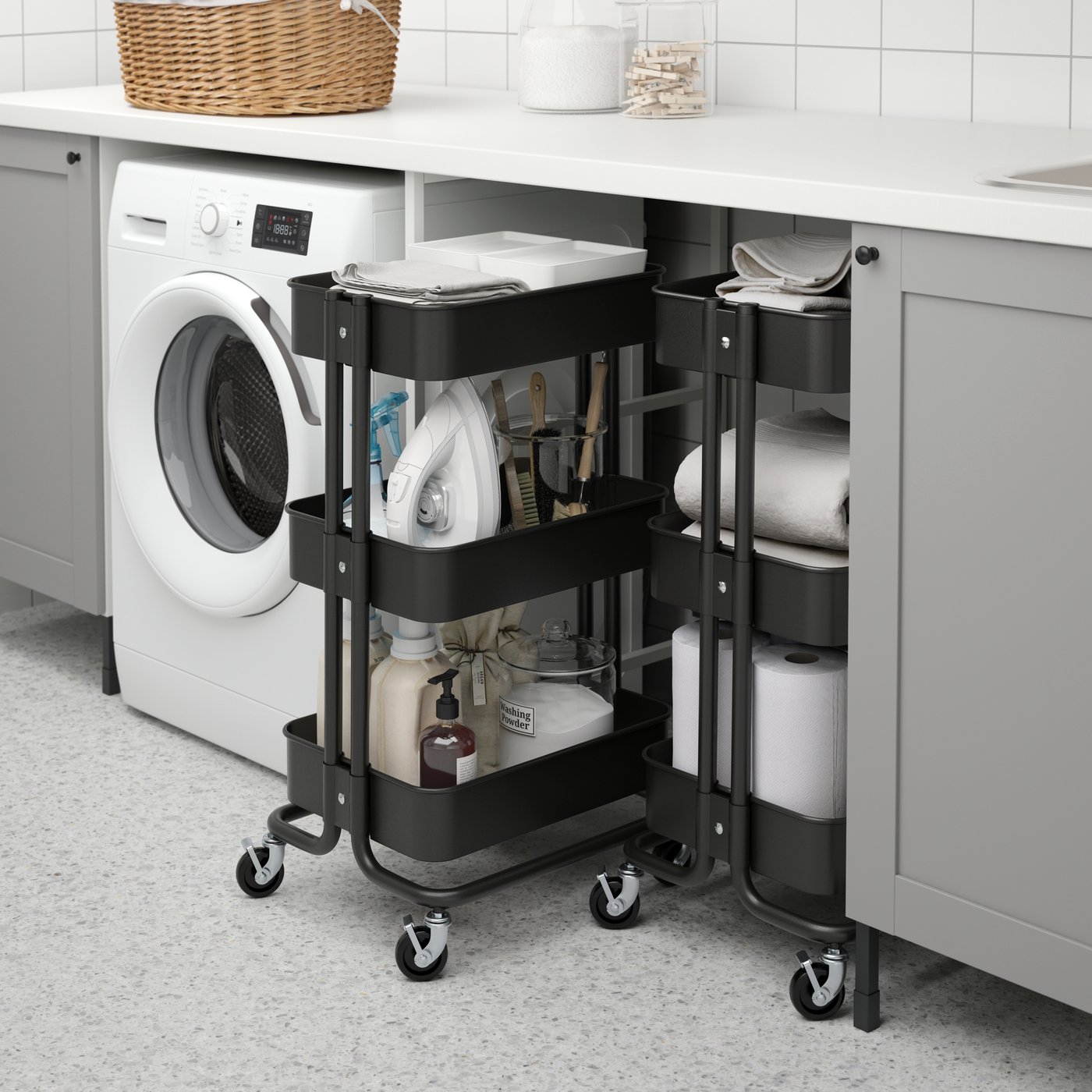 A black RÅSKOG trolley