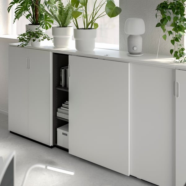 A white GALANT cabinet with sliding doors