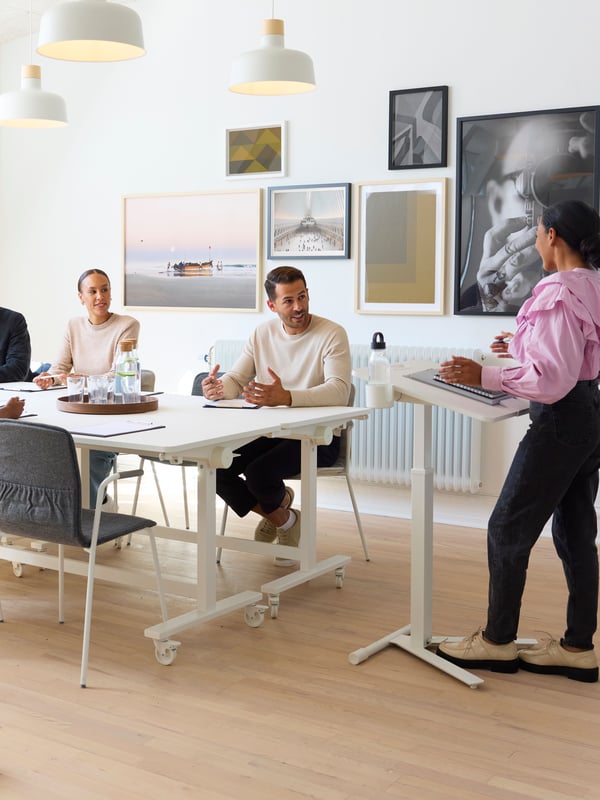 A white MITTZON laptop table with castors in the home office