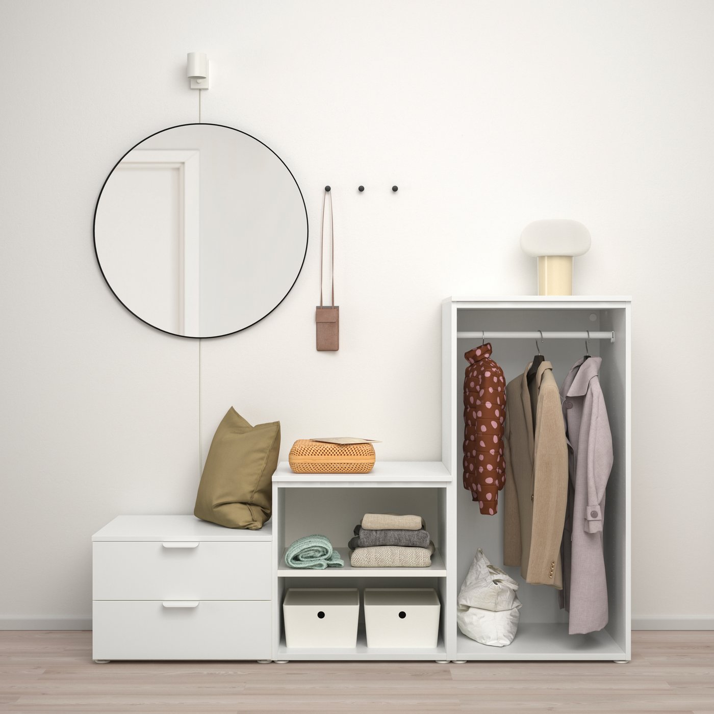 A white/Fonnes white PLATSA wardrobe with 2 doors+2 drawers in the hallway