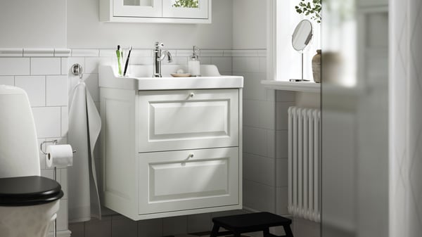A white TÄNNFORSEN wash-stand with drawers