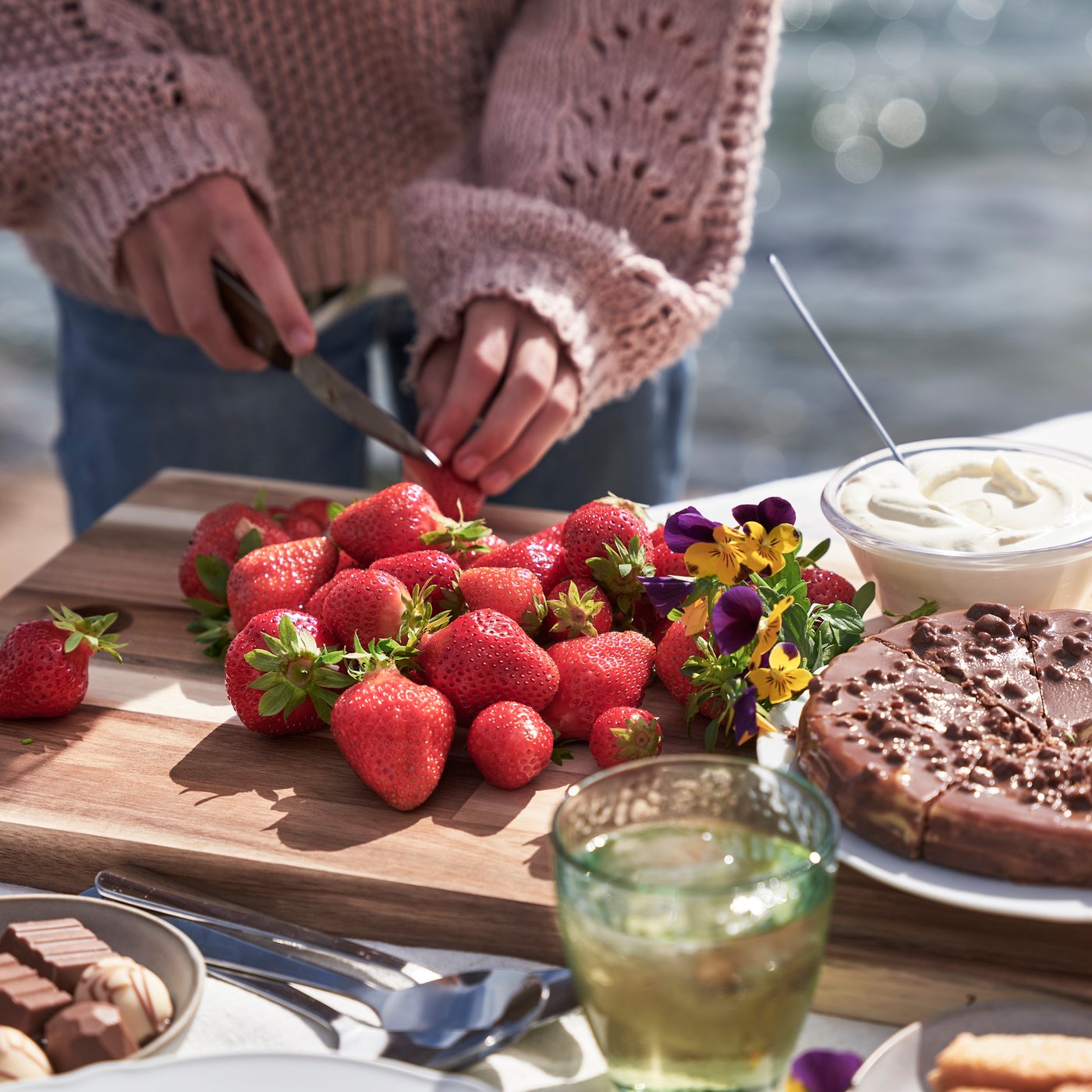 DAIM almond cake, with chocolate and crunch, served with strawberries. 