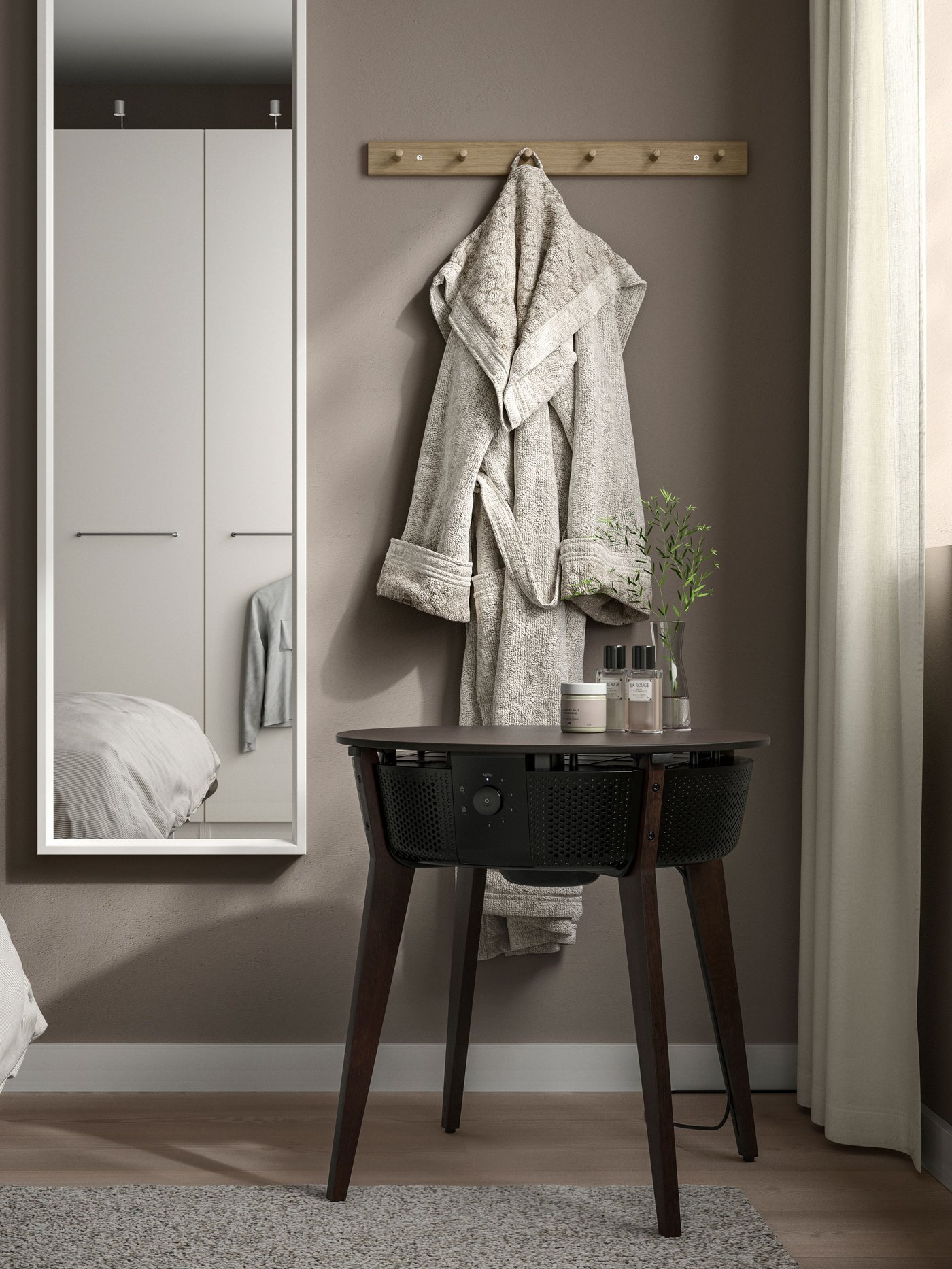 A stained oak veneer/dark brown smart STARKVIND table with air purifier