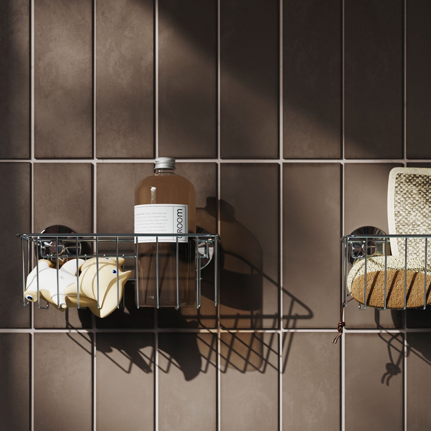 A zinc plated KROKFJORDEN basket with suction cup in the bathroom
