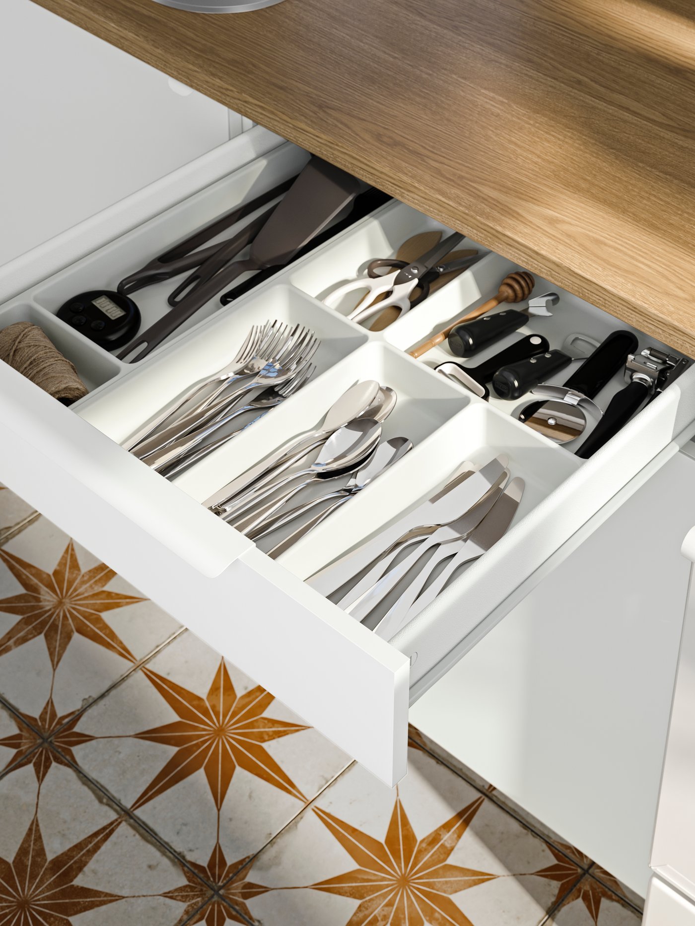 A white STÖDJA cutlery tray