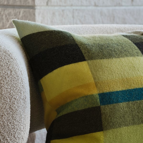 A dark green/blue-green STOCKHOLM 2025 cushion cover