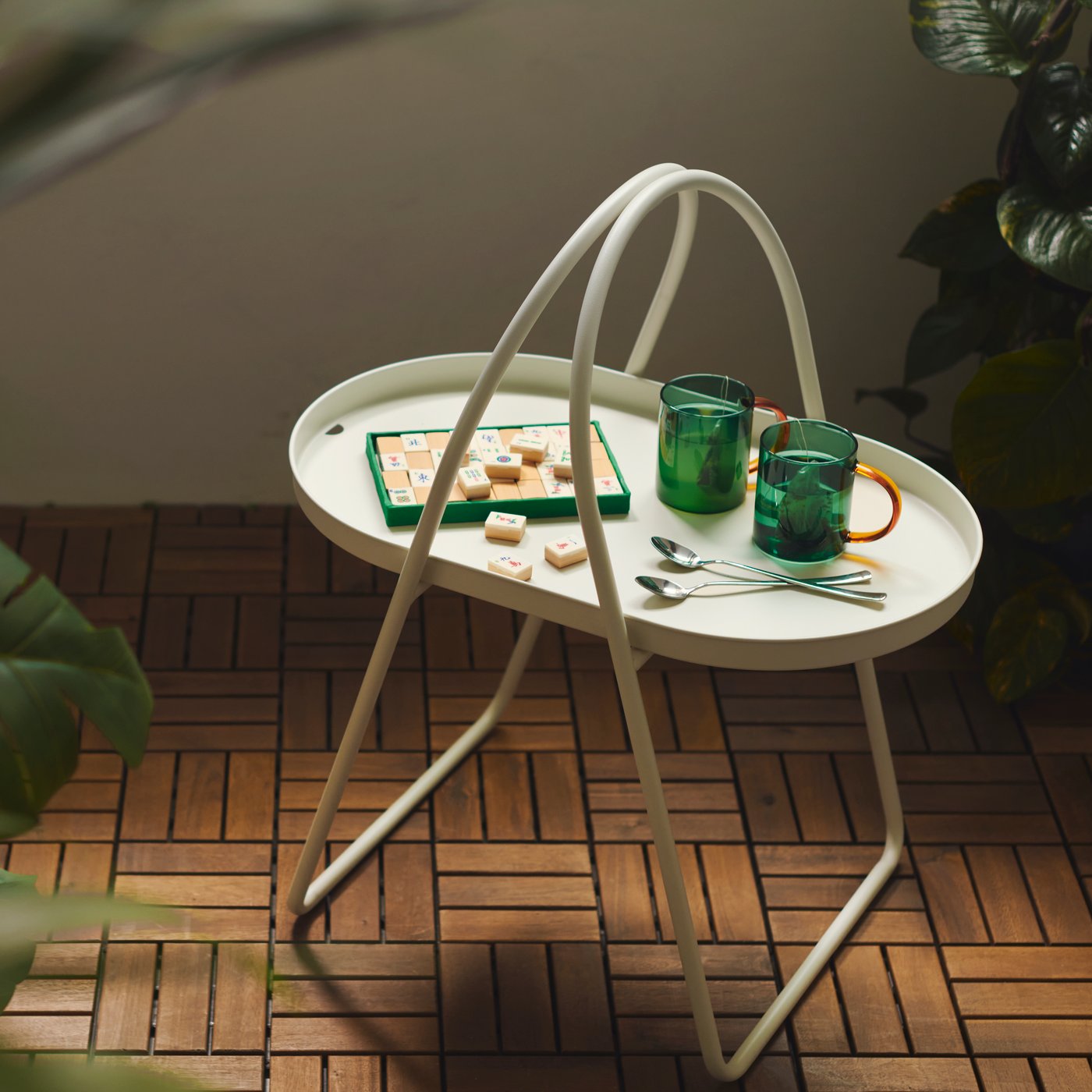 An in/outdoor Monstera FEJKA artificial potted plant outside