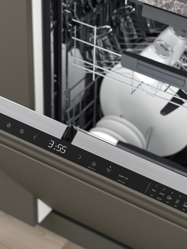 An IKEA 500 ÖSTVEDA integrated dishwasher in the kitchen