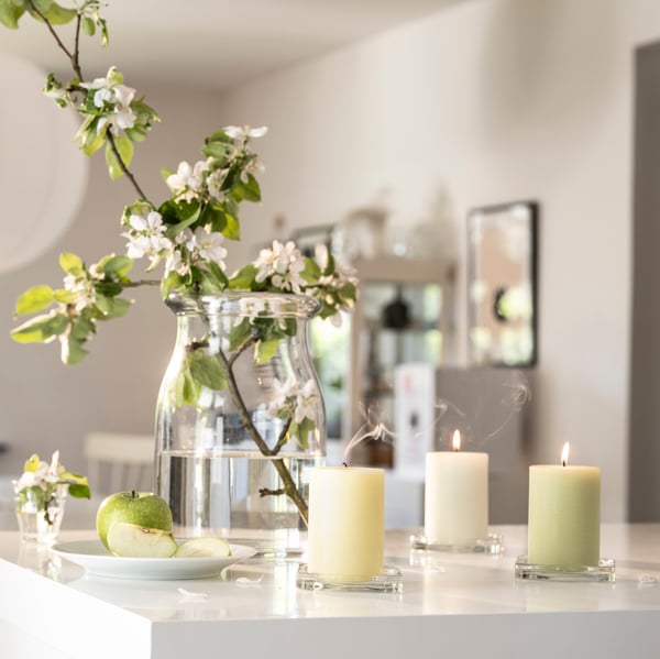 An Apple mixed colours LÖVSKOGSLUND scented pillar candle