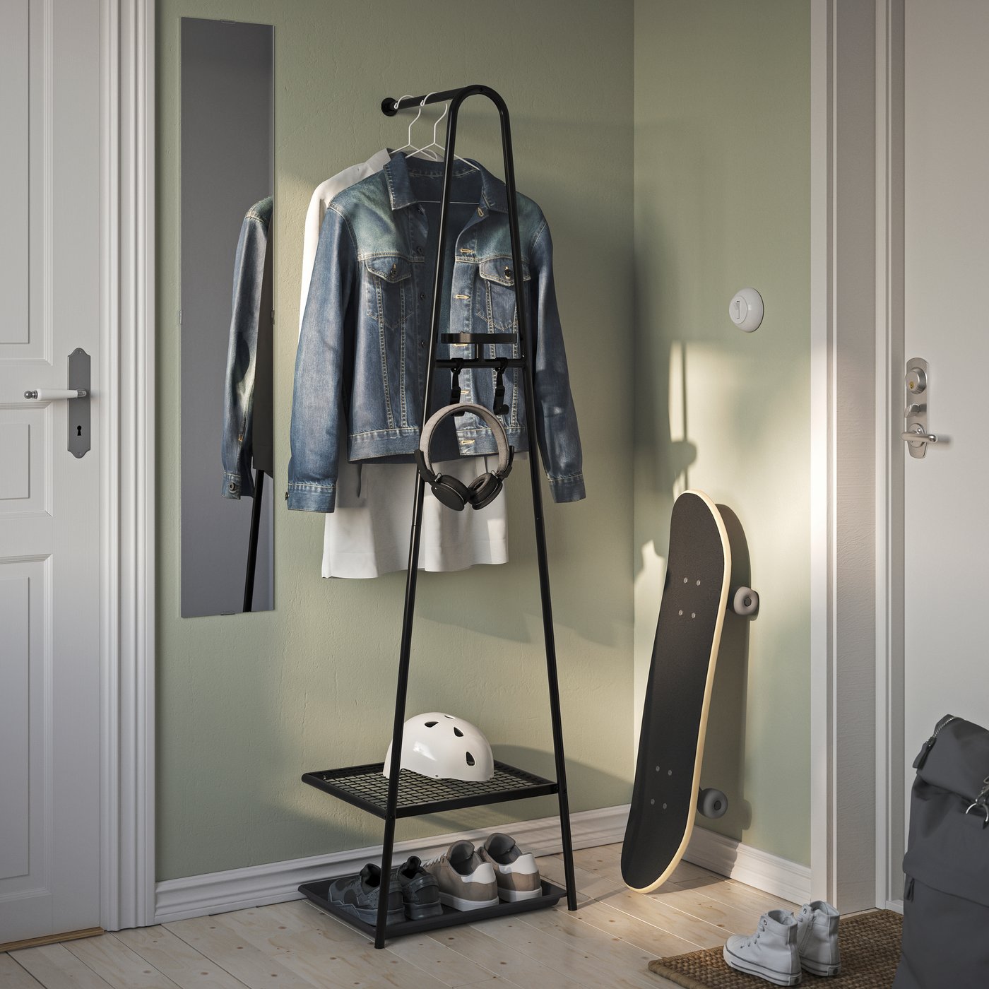 A black ÄLGANÄS clothes rack with shoe storage